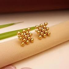 5 Best Hairstyles to Show Off Your Gold Stud Earrings