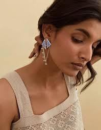How to Wear Long Earrings Without Overpowering Your Look